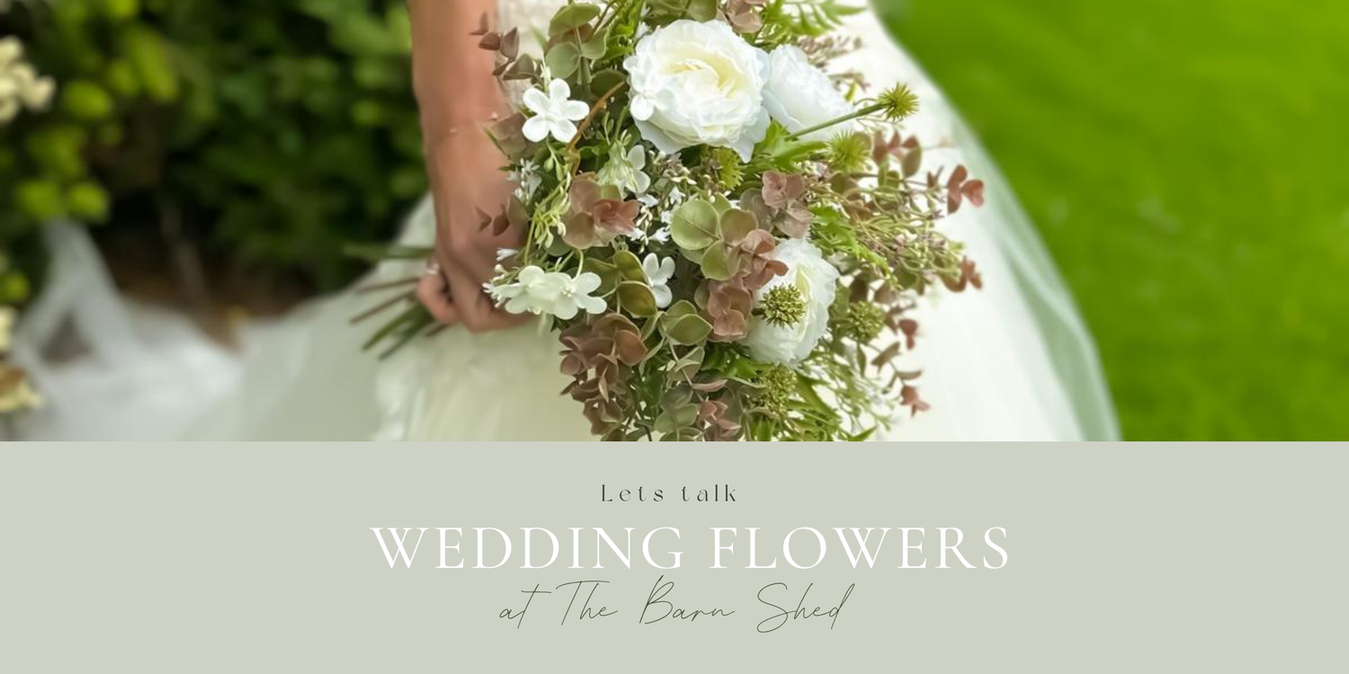 Bride holding wedding flowers